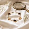 Lucky Clover Station Bracelet Set of 2 — black & gold four-leaf clover bracelet styled on satin, Maison Prema