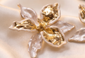 Ivory Dual-Tone Gold Enamel Floral Earrings – anti-tarnish by PremRaga